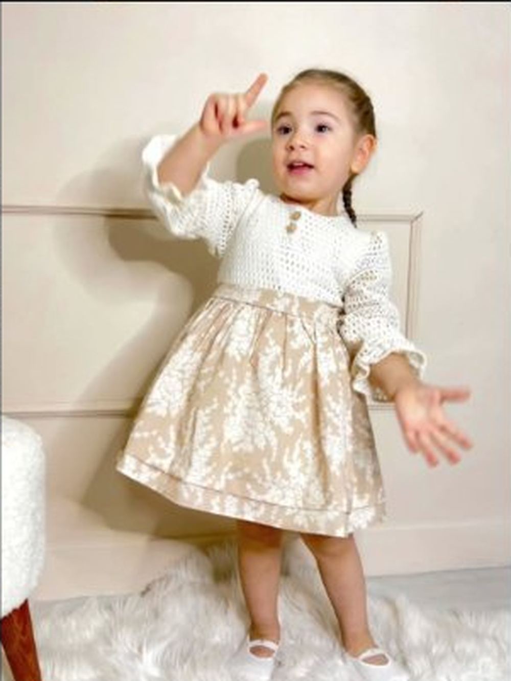 Toddler in a brocade dress